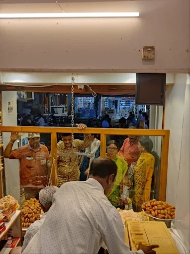 Inside Devi Sweets — customers enjoying fresh mithai